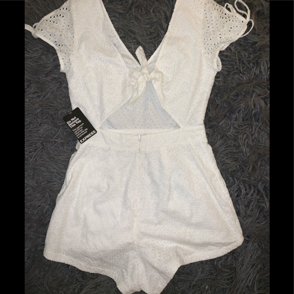 Express shorts romper NEVER been worn.